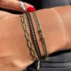 bracelet-ethnique-tissu-femme-noir-dore